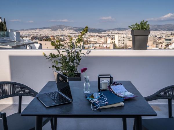 Urban Nest - Suites & Apartments : photo 10 de la chambre loft acropole