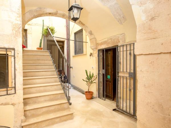 Maison Ortigia : photo 1 de la chambre appartement – bâtiment différent