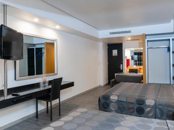 Hotel Harare : photo 3 de la chambre chambre double avec 2 lits doubles
