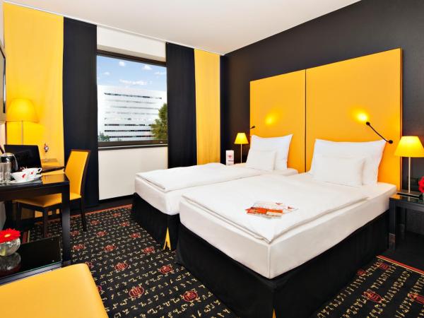 Vienna House Easy by Wyndham Katowice : photo 6 de la chambre chambre lits jumeaux exécutive