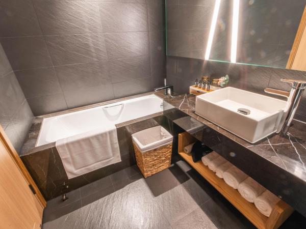 Hotel Coka Chuansha Metro - Shanghai PVG Airport : photo 4 de la chambre chambre familiale avec baignoire