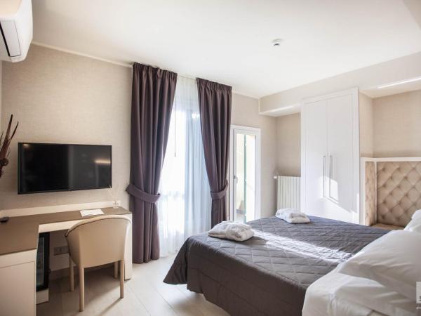 Hotel Cavour : photo 3 de la chambre chambre deluxe double ou lits jumeaux