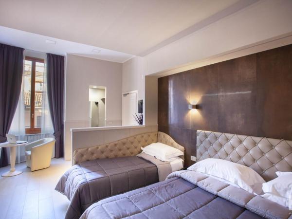 Hotel Cavour : photo 3 de la chambre chambre triple deluxe