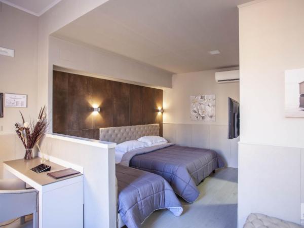 Hotel Cavour : photo 10 de la chambre chambre quadruple