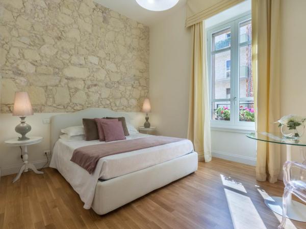 BB22 Cagliari : photo 4 de la chambre chambre lit king-size deluxe