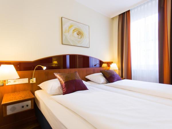 Austria Classic Hotel Wien : photo 4 de la chambre chambre triple premium - vue sur cour