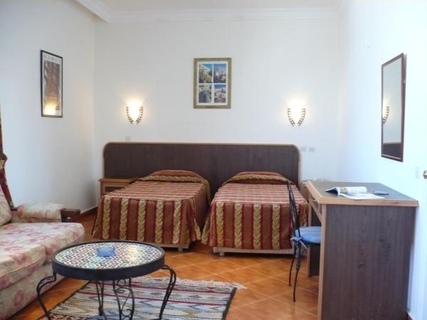 Hotel Continental : photo 6 de la chambre chambre quadruple