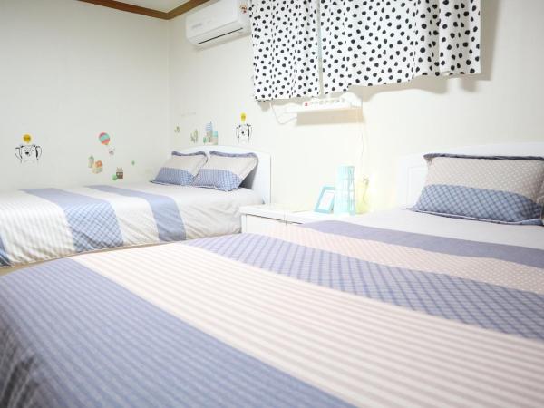 Jeong House : photo 1 de la chambre chambre quadruple Économique avec salle de bains commune