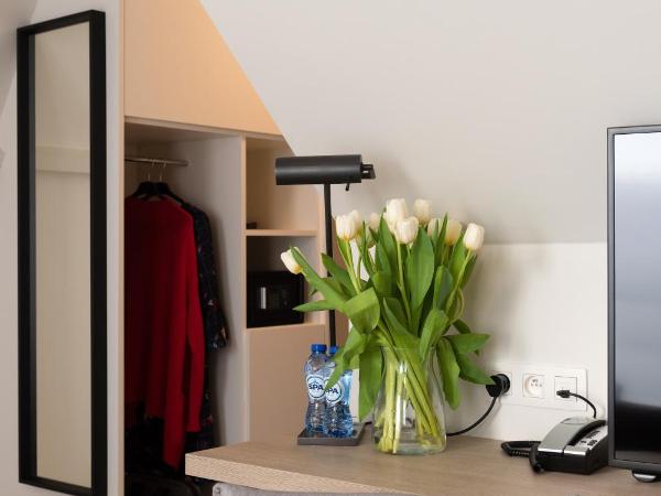 Martin's Brugge : photo 2 de la chambre chambre quadruple