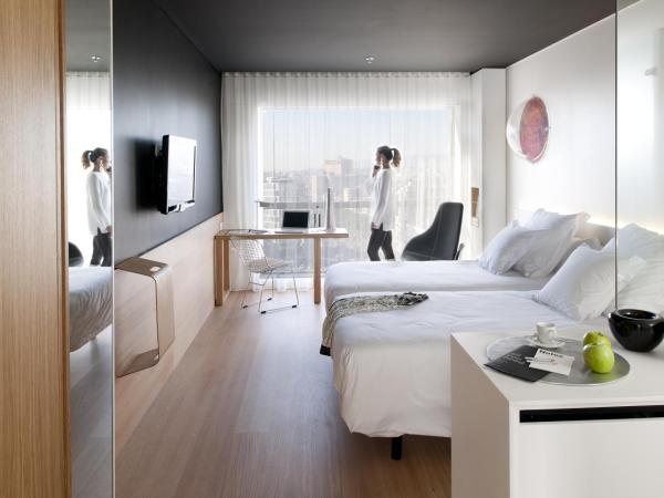 Barceló Sants : photo 5 de la chambre chambre deluxe double ou lits jumeaux