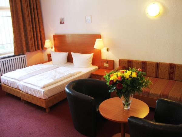 Hotel Aster an der Messe : photo 1 de la chambre chambre familiale