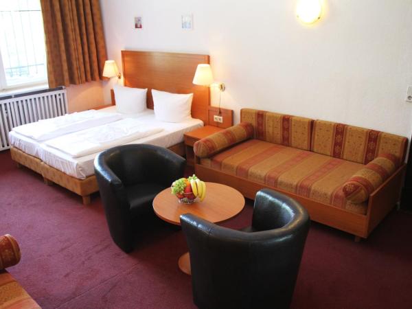 Hotel Aster an der Messe : photo 7 de la chambre chambre familiale