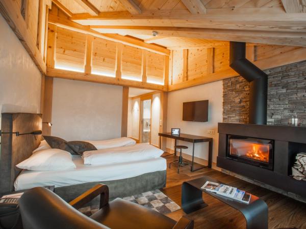 Bernerhof Swiss Quality Hotel Gstaad : photo 10 de la chambre loft alpin