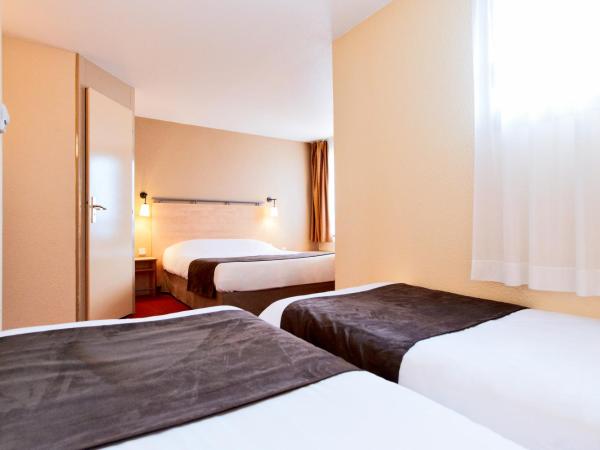 Kyriad Beauvais Sud : photo 2 de la chambre chambre quadruple avec 1 lit double et 2 lits simples