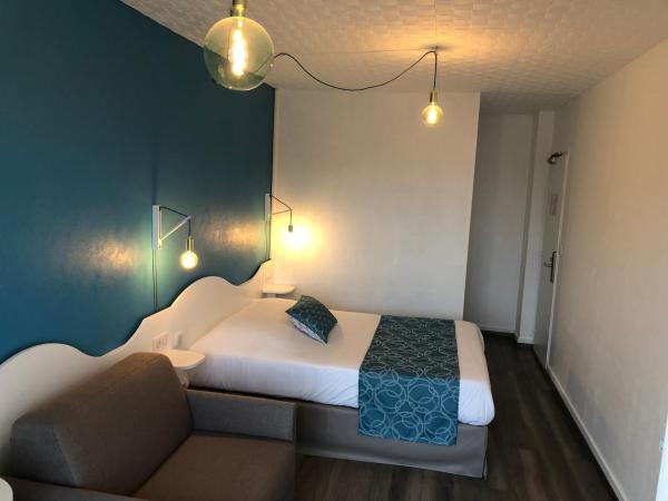 Hôtel La Côte Océane : photo 9 de la chambre chambre triple (2 adultes & 1 enfant)