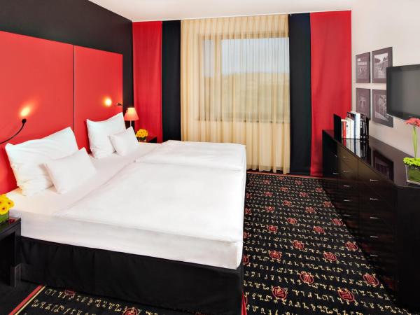 Vienna House Easy by Wyndham Katowice : photo 10 de la chambre classic apartment with king or two single beds