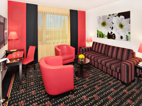 Vienna House Easy by Wyndham Katowice : photo 9 de la chambre classic apartment with king or two single beds