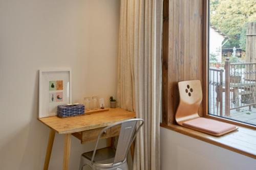 Wei Wen Inn : photo 8 de la chambre chambre double ou lits jumeaux standard - vue sur jardin