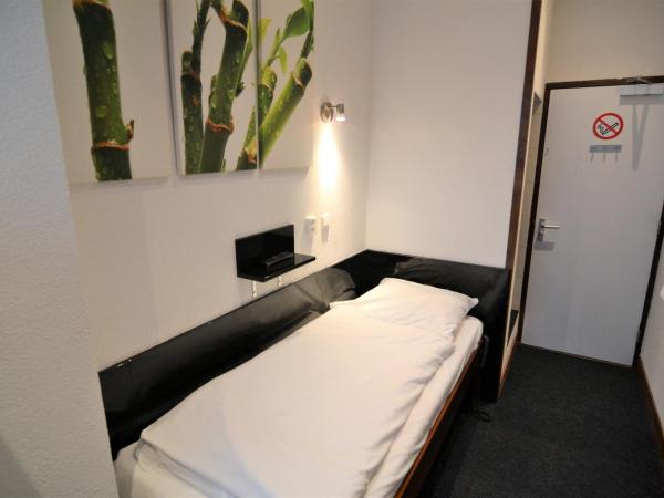 Hotel Bienvenue : photo 2 de la chambre chambre simple avec douche 