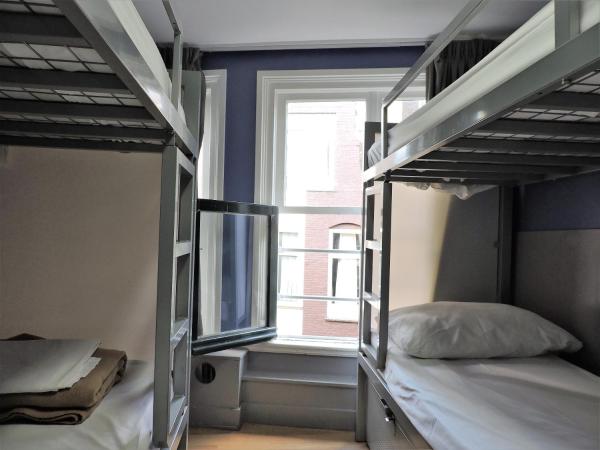 The White Tulip Hostel : photo 1 de la chambre lit dans un dortoir de 4 lits