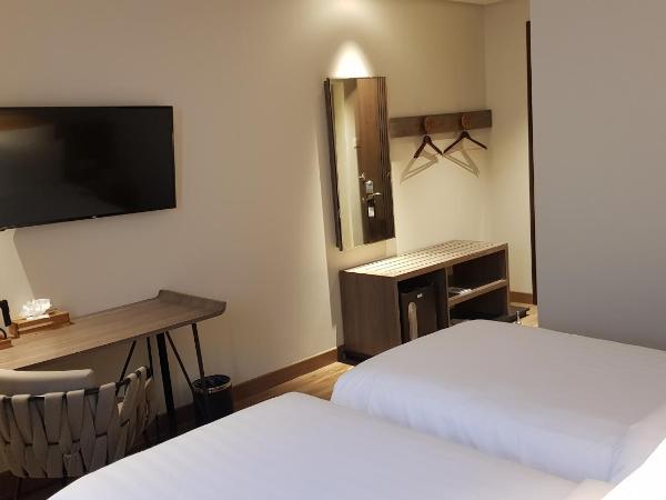 Luminor Hotel Kota Jakarta By WH : photo 7 de la chambre chambre deluxe double ou lits jumeaux