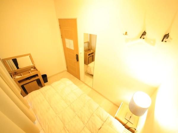 Stitches House : photo 3 de la chambre chambre simple avec salle de bains commune
