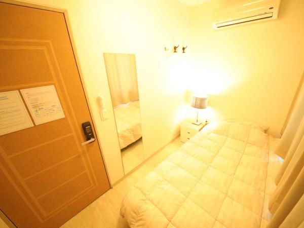 Stitches House : photo 5 de la chambre chambre simple avec salle de bains commune