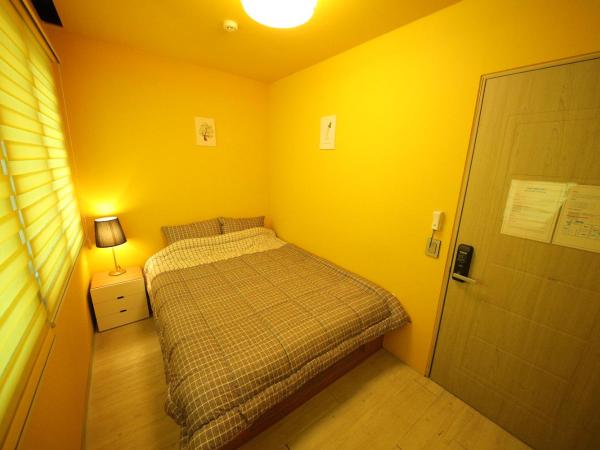 Stitches House : photo 5 de la chambre chambre double standard avec salle de bains commune