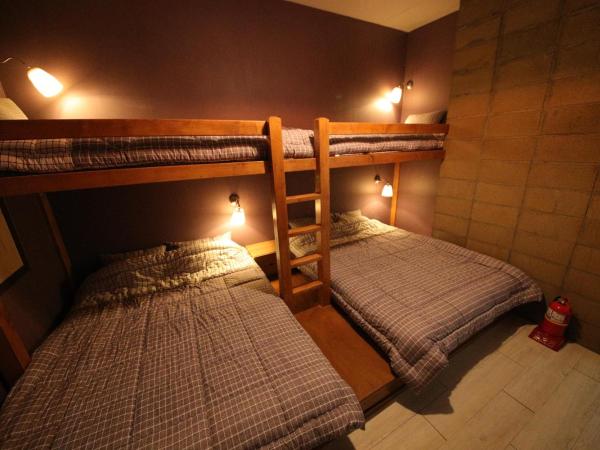 Stitches House : photo 2 de la chambre chambre familiale avec salle de bains privative
