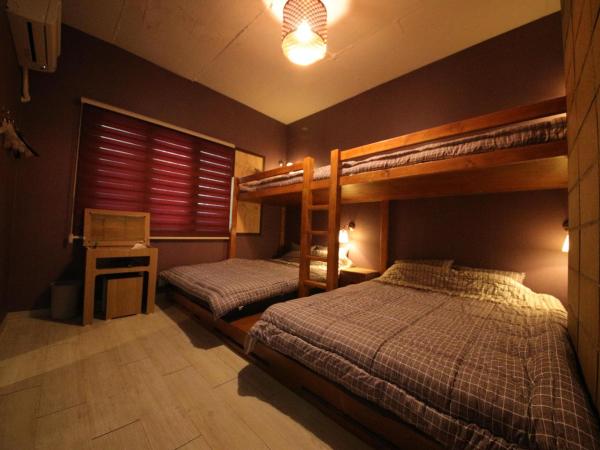 Stitches House : photo 1 de la chambre chambre familiale avec salle de bains privative