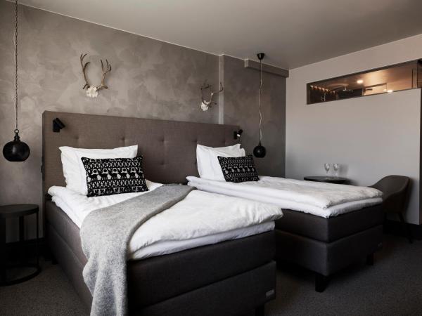 Lapland Hotels Bulevardi : photo 3 de la chambre chambre lits jumeaux deluxe mystique avec sauna