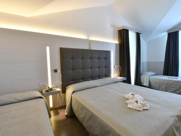 Hotel Europa : photo 5 de la chambre chambre quadruple premium avec forfait plage