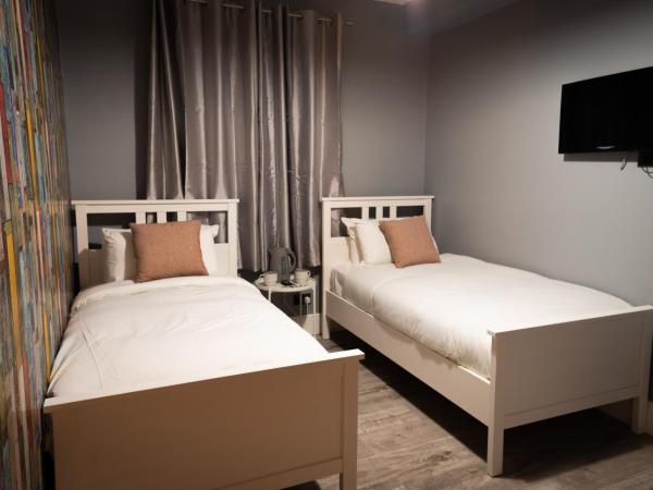 REM Hotel : photo 5 de la chambre chambre lits jumeaux