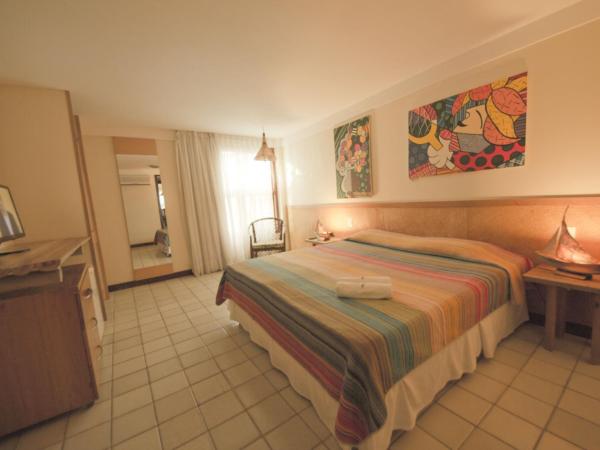 Pousada Manga Rosa Beira Mar : photo 1 de la chambre chambre double