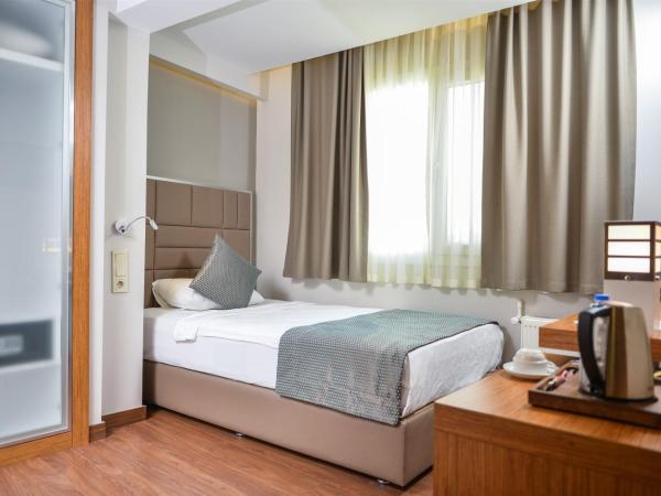 Hakcan Hotel : photo 1 de la chambre grande chambre simple