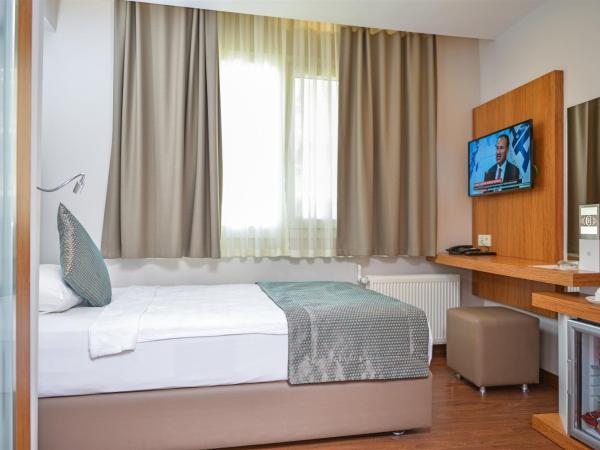 Hakcan Hotel : photo 2 de la chambre grande chambre simple