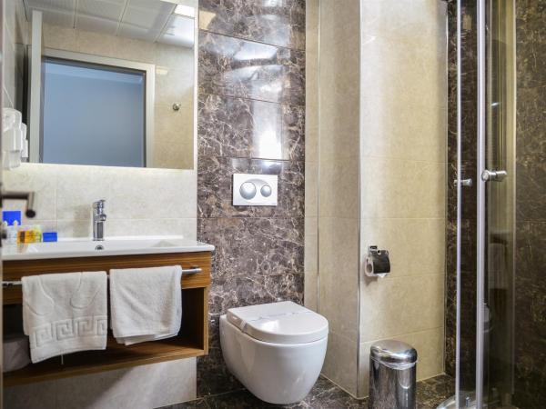 Hakcan Hotel : photo 5 de la chambre grande chambre simple