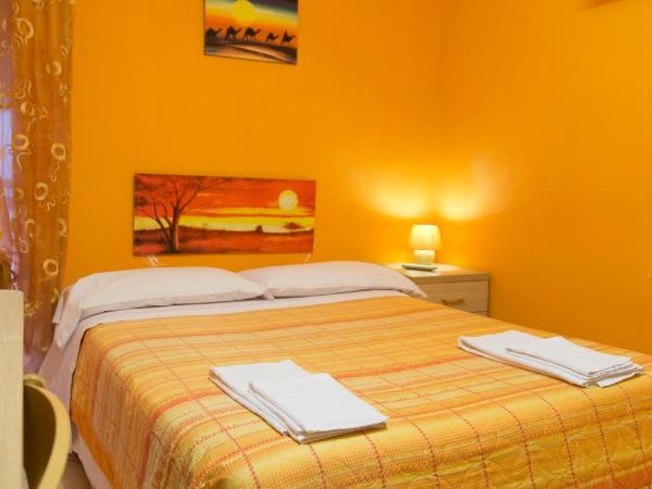 Campi Flegrei House : photo 5 de la chambre chambre double ou lits jumeaux avec salle de bains privative externe