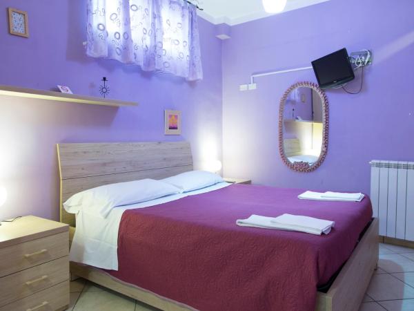 Campi Flegrei House : photo 6 de la chambre chambre double ou lits jumeaux avec salle de bains privative