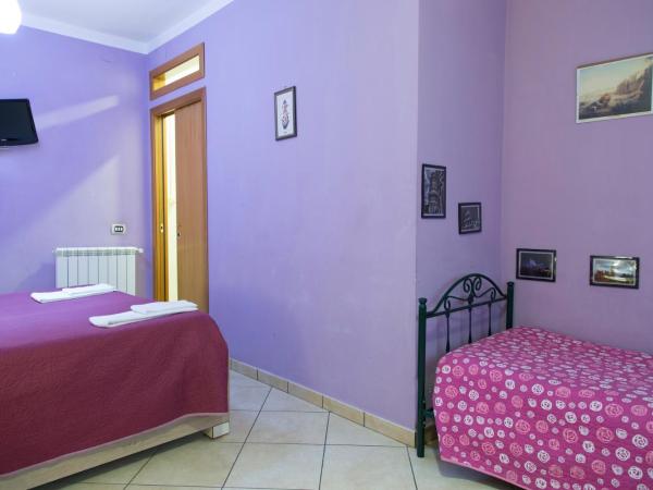Campi Flegrei House : photo 7 de la chambre chambre double ou lits jumeaux avec salle de bains privative