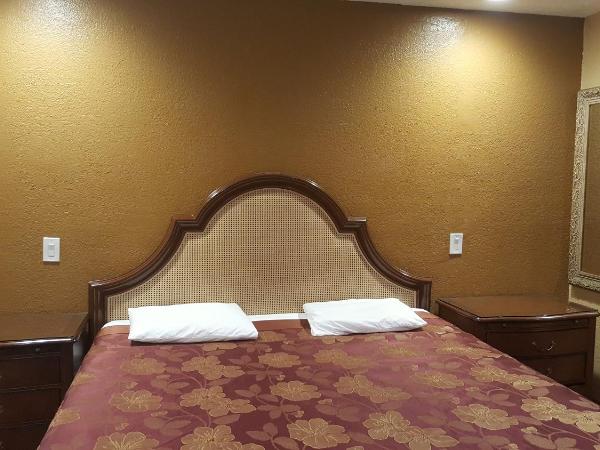 Central Inn Motel : photo 1 de la chambre chambre lit queen-size - accessible aux personnes à mobilité réduite