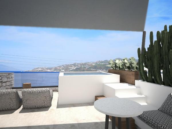 Apiro Mykonos : photo 7 de la chambre hébergement supérieur avec jacuzzi extérieur - vue sur mer