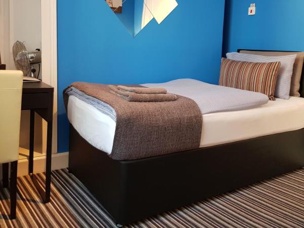 Robin 7 Lodge City Centre : photo 2 de la chambre chambre simple standard avec salle de bains privative