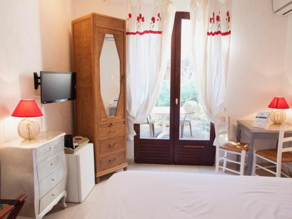 Motel Cap Sol : photo 4 de la chambre chambre double ou lits jumeaux classique avec vue sur le jardin