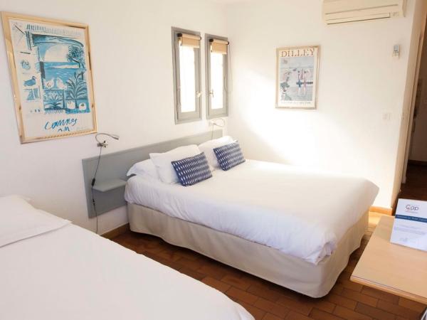 Motel Cap Sol : photo 2 de la chambre chambre double ou lits jumeaux confort avec vue sur jardin