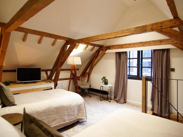 Authentic Farmhouse - De Vergulden Eenhoorn : photo 2 de la chambre suite avec baignoire