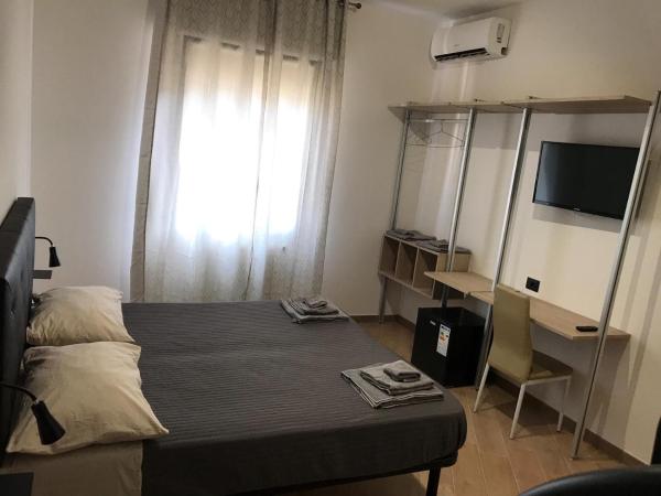 Riva Reno 4 Rooms : photo 1 de la chambre chambre quadruple