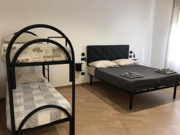 Riva Reno 4 Rooms : photo 2 de la chambre chambre quadruple