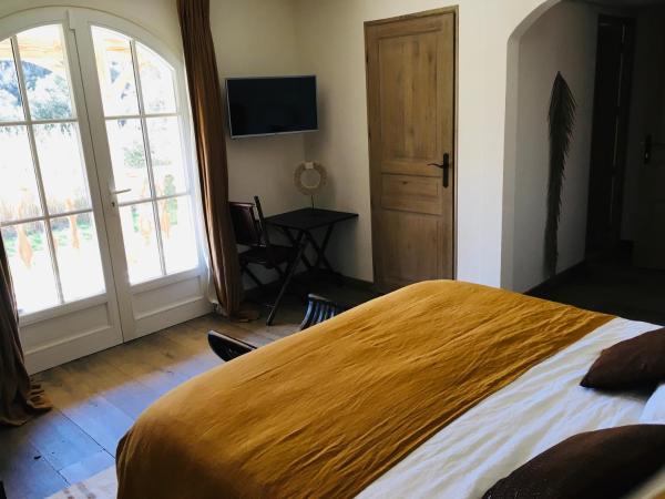 Le Clos des Sept Palmiers : photo 6 de la chambre chambre double avec balcon - vue sur mer