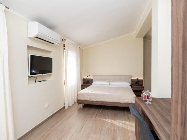 Scaligero Rooms : photo 3 de la chambre chambre lit king-size avec baignoire spa